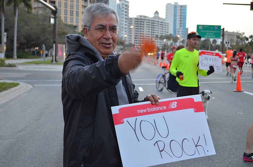 Juan Hidalgo waits to see Claudia Moscoso-Andersen run by on Gulf Stream.