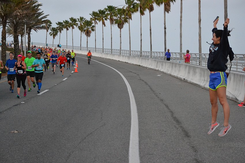 Sarah Liscia cheers on her sister Rachel and friend Chelse Howland.