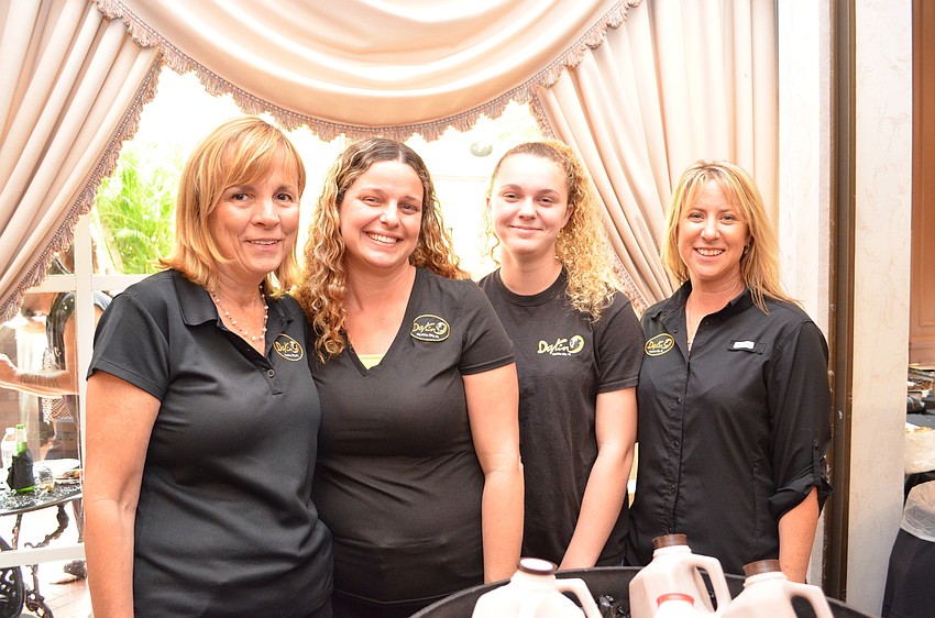 Charlene Hinkel, Cindy and Jena Smith with Jen Griffith helped serve regular and chocolate milk from Dakin Dairy to help wash down all the sweets.