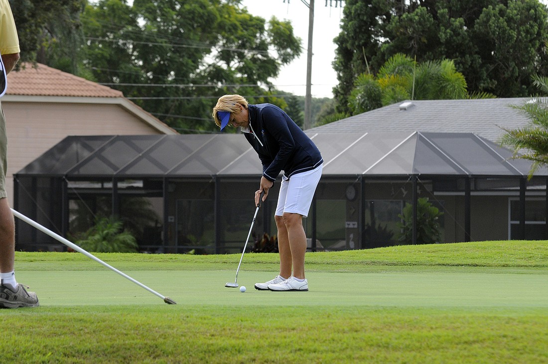LPGA Legends Tour player Barb Mucha putts for Team USA during the 2015 ISPS Handa Cup.