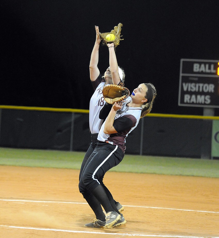 Braden River's Lexi Phelps and Bethaney Keen collide while going for a pop up.