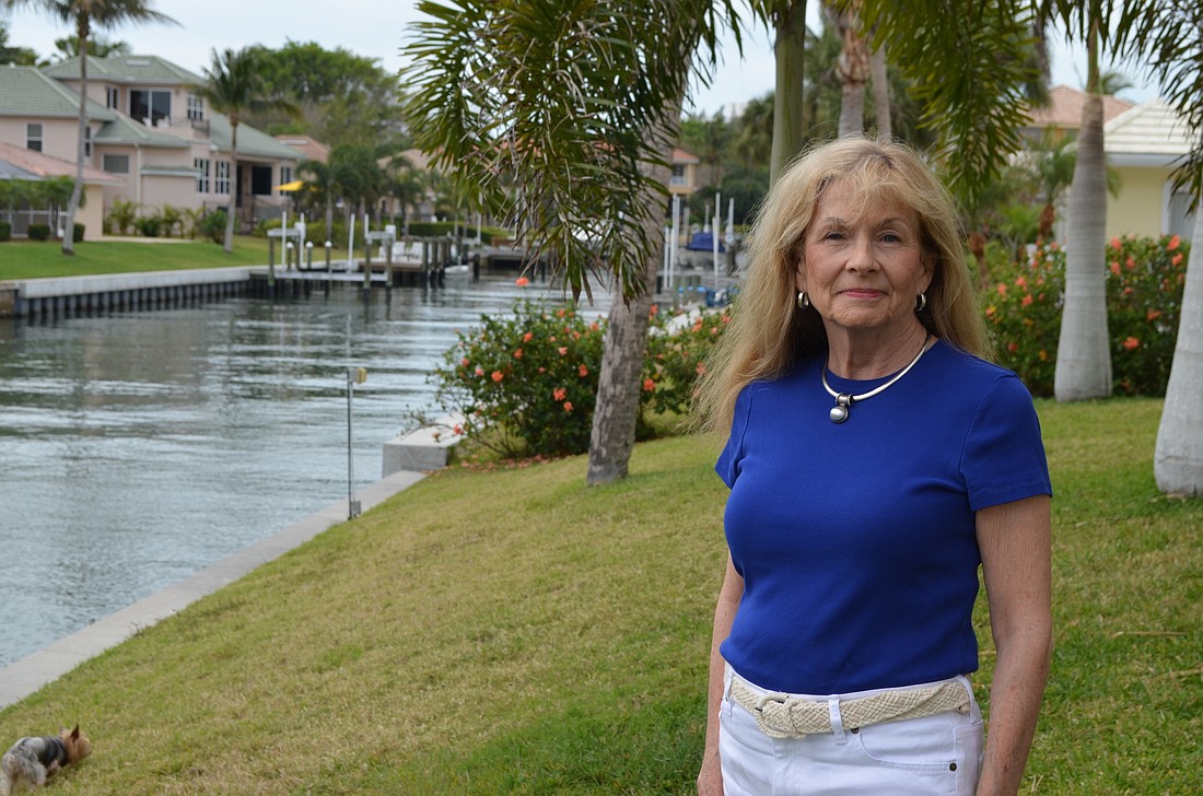 Lynn Larson, pictured outside of her Country Club Shores home, is originally from Picayune, Miss. She and her husband, Jim, moved to Longboat Key permanently in 2002.