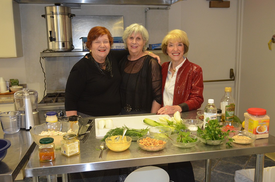 Sylvia Pastor, center, with her sous chefs Lynn Burton and Doris Kaplan March 4, at Temple Beth Israelâ€™s â€˜In the Kitchen with Sylvia.â€™