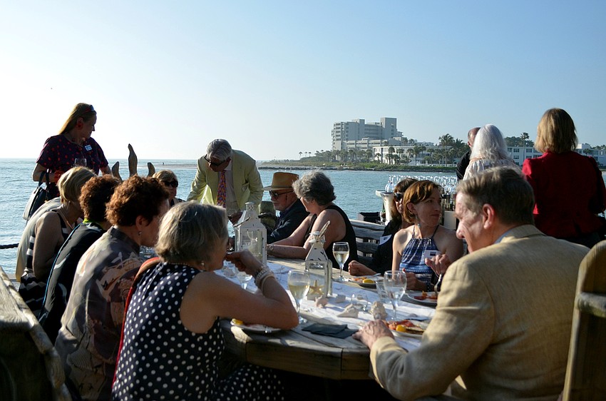 Guests enjoy cocktails on the gulf at the Asolo Rep Major Donor Party.