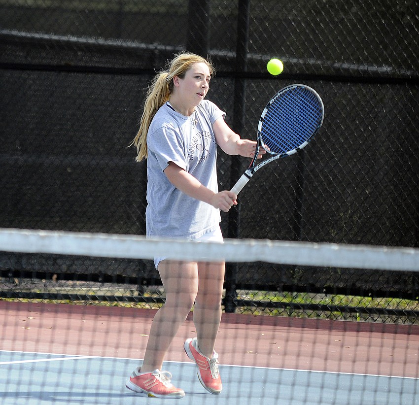 ODA's Madison Reese sends the ball back over the net during her No. 3 singles match.