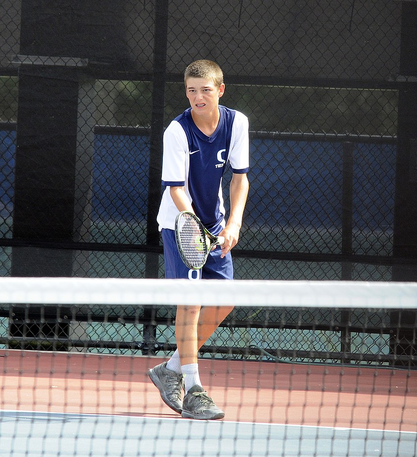 ODA's Jake Krug prepares to serve the ball during his No. 2 singles match.
