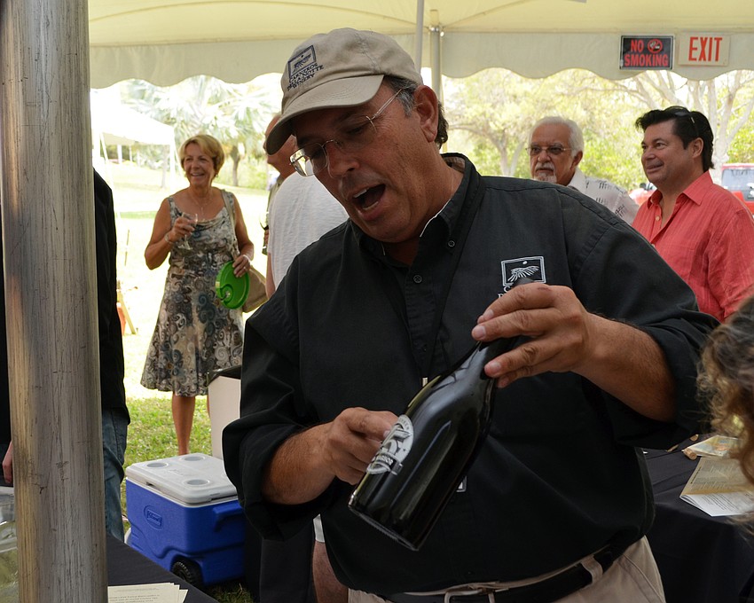 David Harmon talks to guests about the Carneros Della Notte winery.