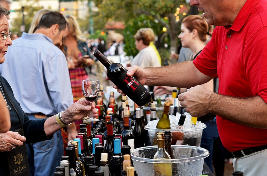 Guests enjoyed a wine tasting before being seated for dinner at Banquet on the Block.
