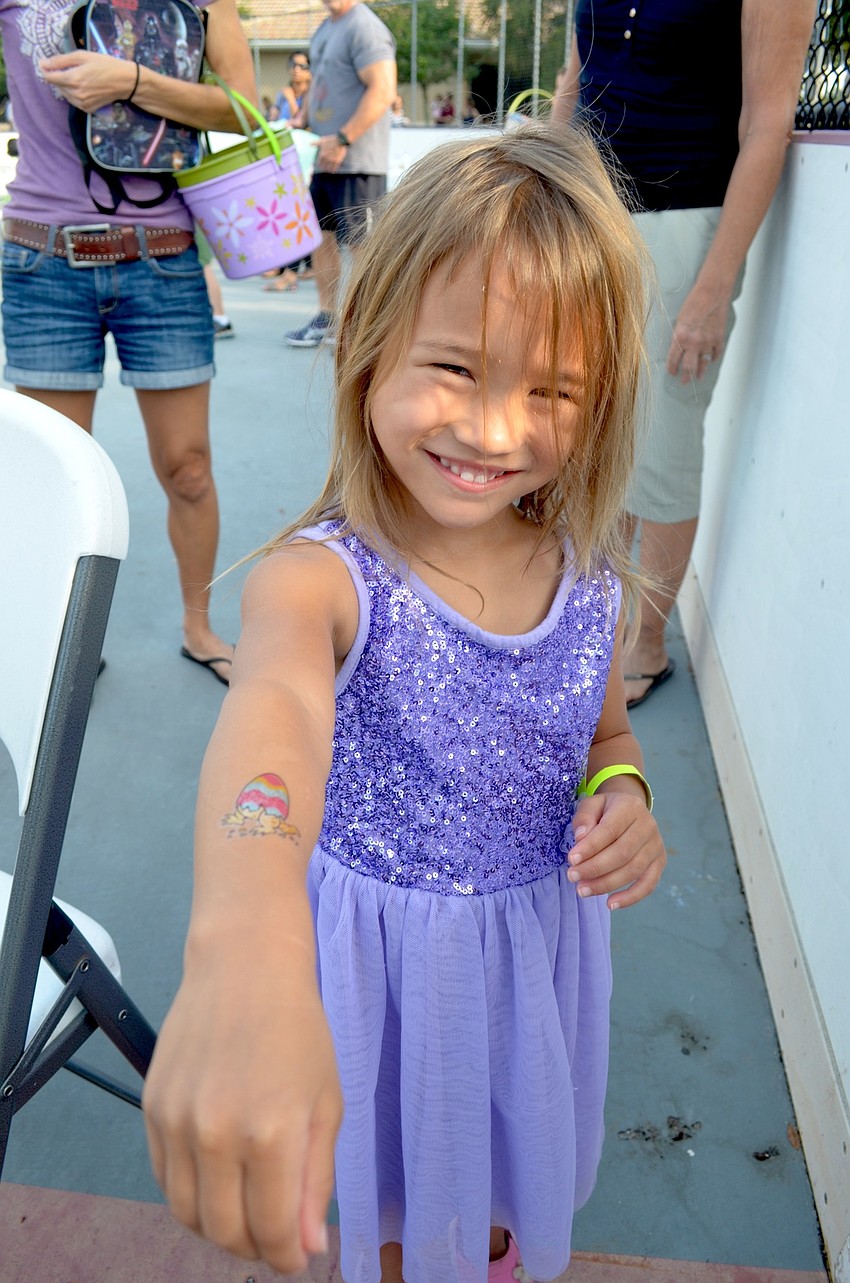 Emi Seidl shows off her Easter temporary tattoo.