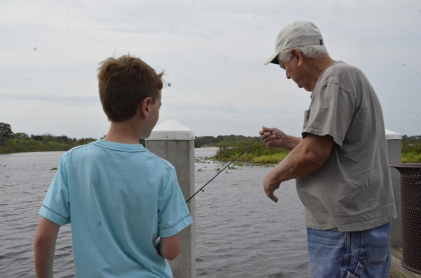 Ethan Hylwa gets help with his line from his grandfather, John Summers, an East County resident.