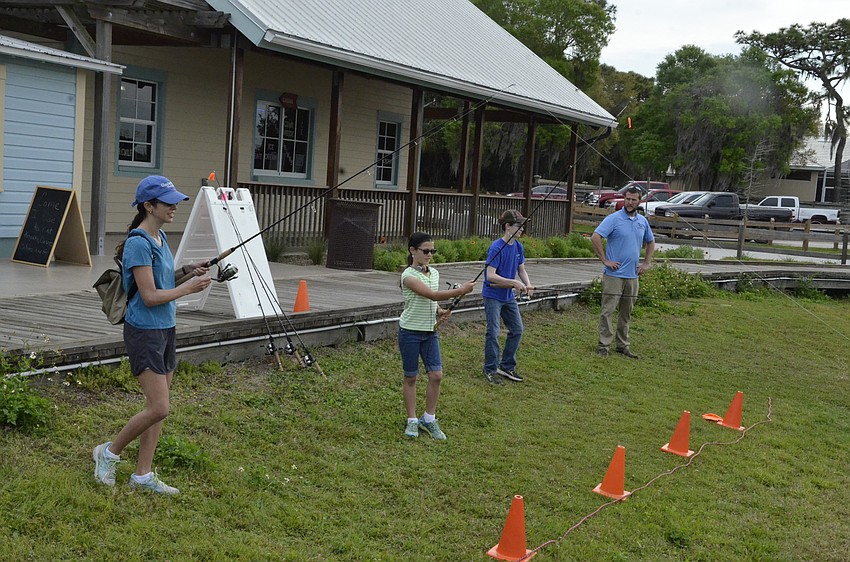 Doris, Dannica and Dylan Schmucker walked over to the festival from River Landing, hoping to beat the rain and get some fresh air, Doris Schmucker said.