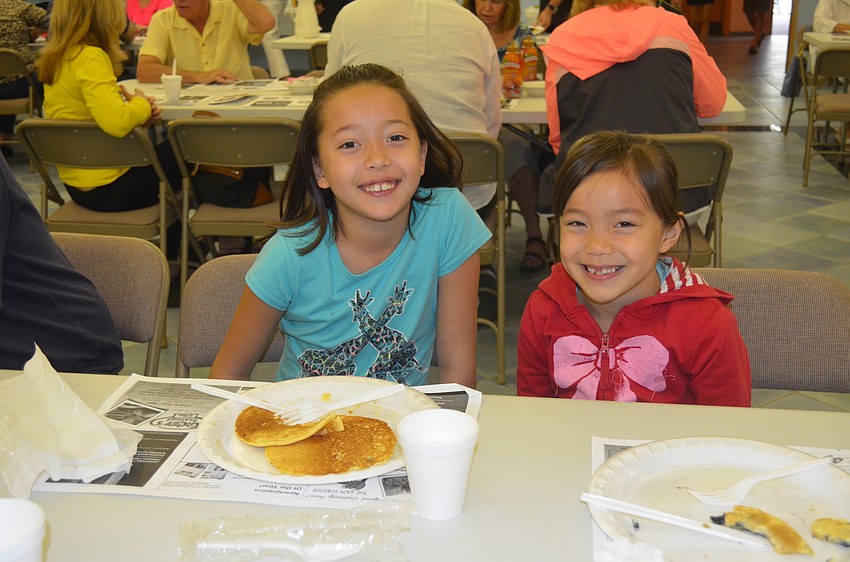 Sidney Kim, 8, and sister, Seri Jane, 6