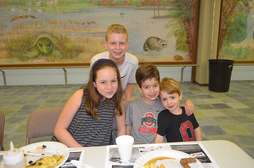 Katie Pollack, 10, and brother, Will, 12, with Nicholas Rinaldi, 6, and brother, Christopher, 3