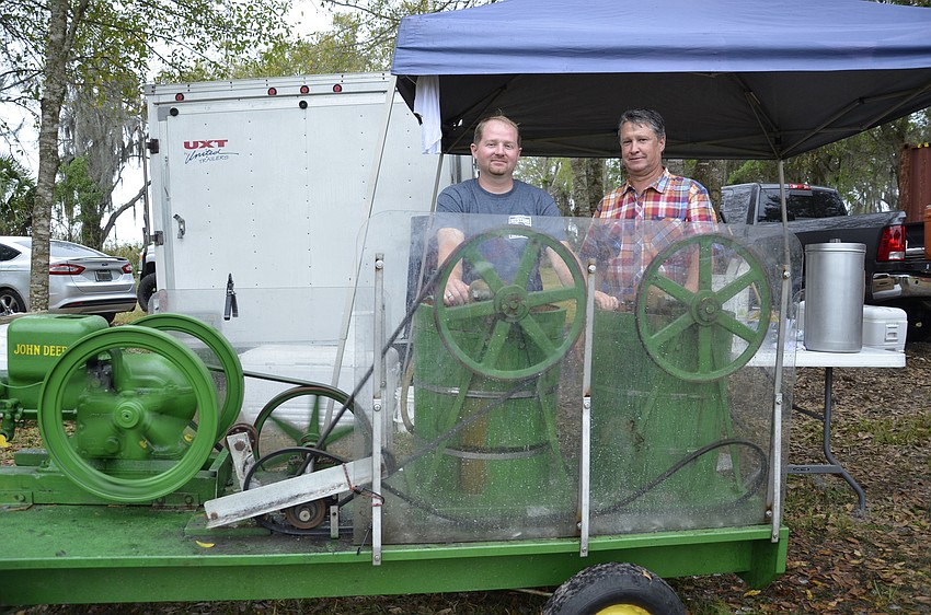 Kevin Mullett of Sarasota and Jay Miller of Myakka City operate an Amish ice cream machine on behalf of Replay Outreach, an organization for at-risk youth.  Repost had a stand at the EGGolution and passed out ice cream to attendees.