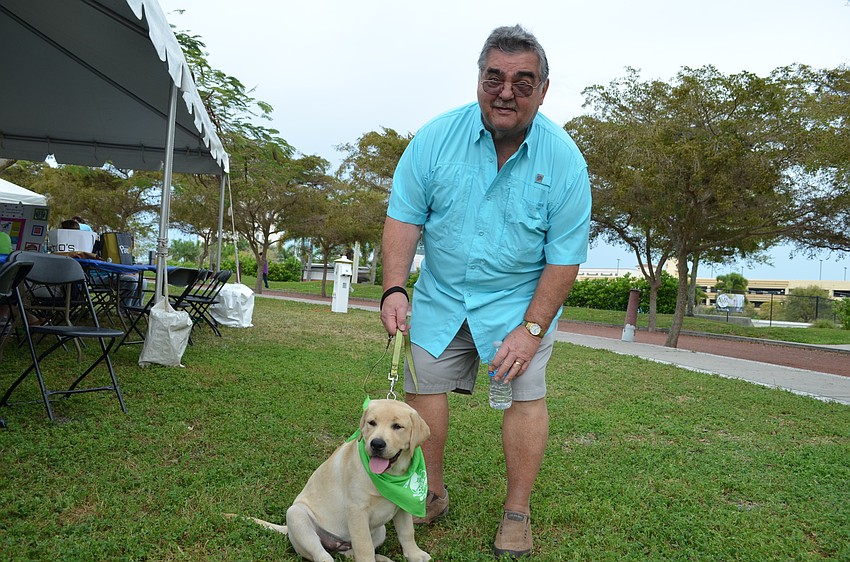Harry Bickford with his puppy Suzy.