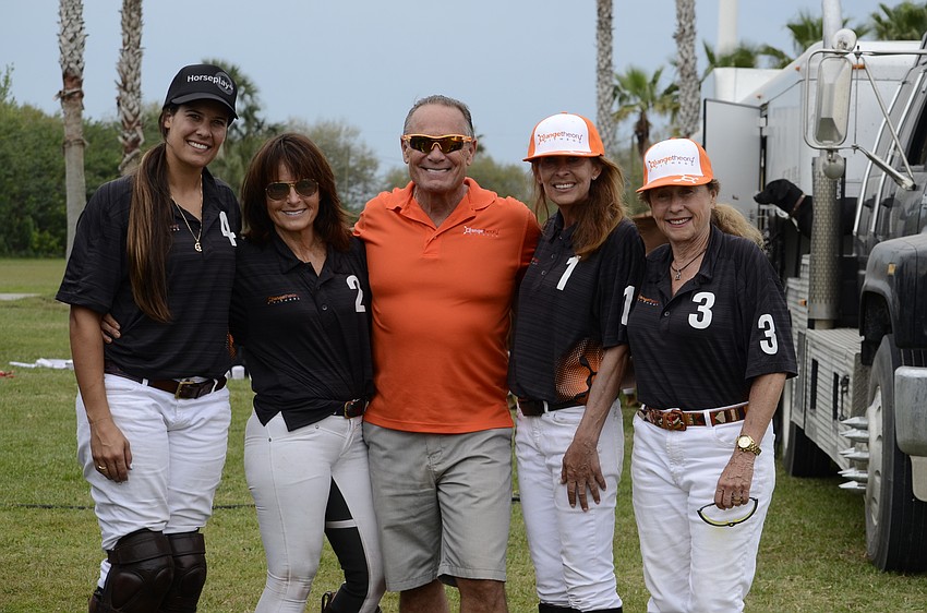 Courtney Asdourian, Kathy Iverson, Tammy Wyman and Sylvia McNichol play for the Orange Theory of Lakewood Ranch team, sponsored by franchisee Mark Flannagan.