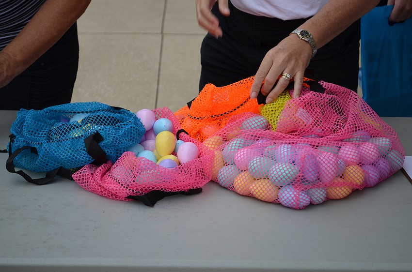 More than 2,000 colorful eggs floated in the instructional pool for children to collect.