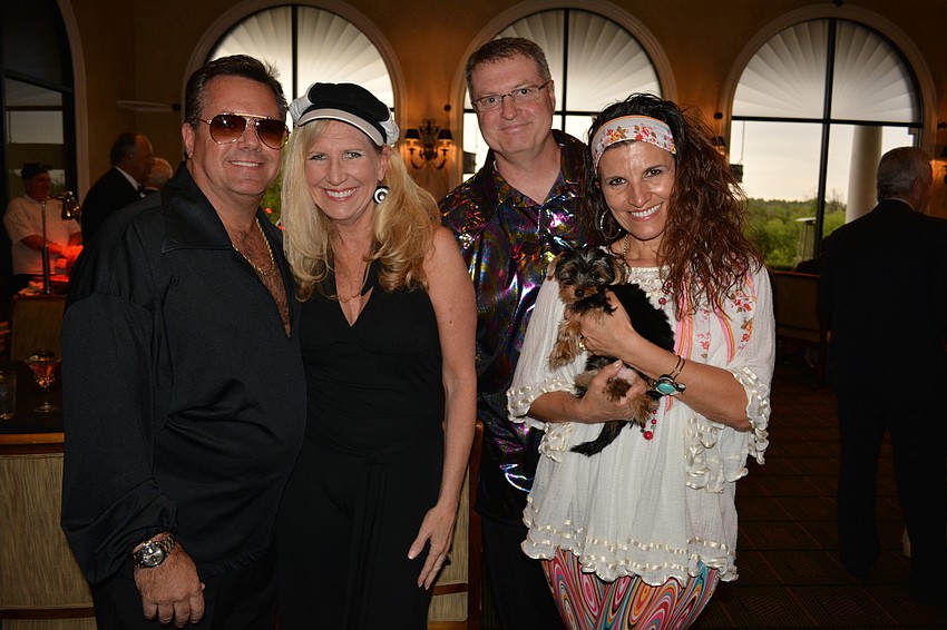 Bruce and Michelle Hearon with Mark and Violeta Huesman