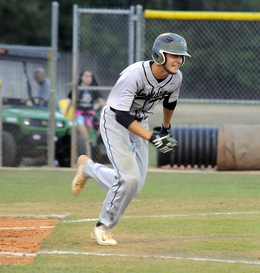 Lakewood Ranch senior outfielder Trevor Losada races down the first base line.