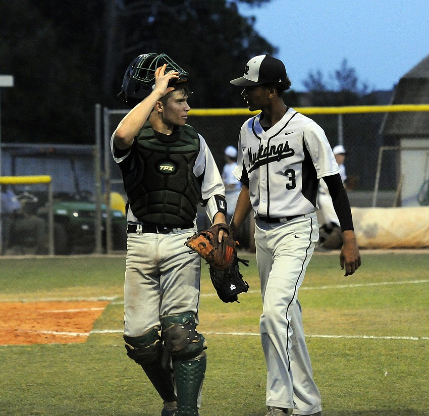 Lakewood Ranch's Christian Lowe and Pablo Garabritos talk in between innings.