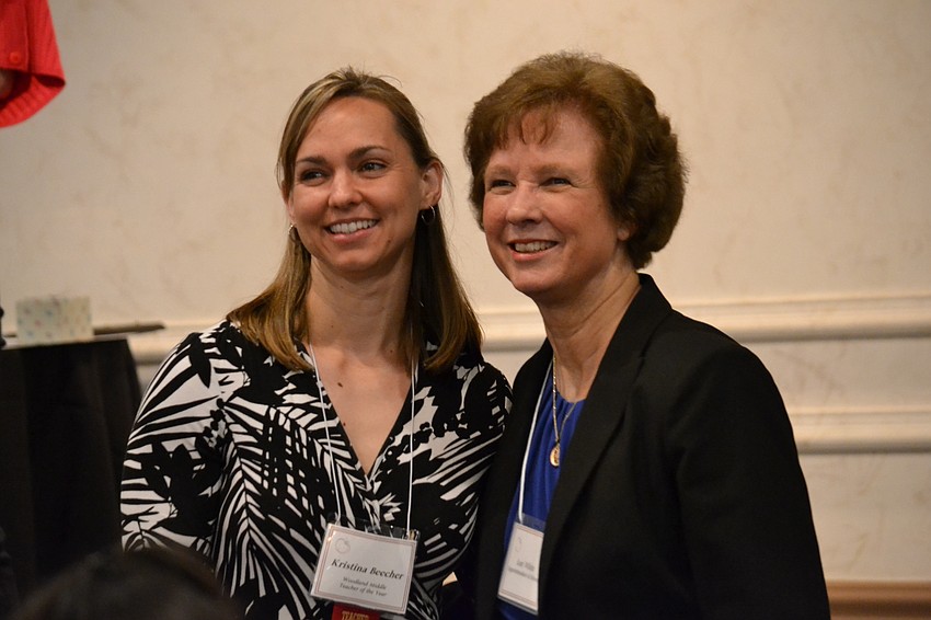Finalist and Teacher of the Year award for Woodland Middle School Kristina Beecher with Sarasota County Schools Superintendent Lori White.
