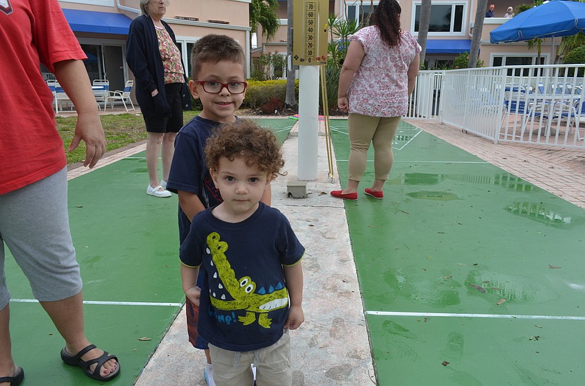 Antonio Edmoundson, 5, and Isaiah O’Brien, 9