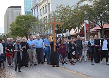 Hundreds joined in along the route for the Stations of the Cross.