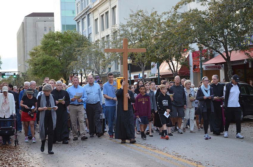 Hundreds joined in along the route for the Stations of the Cross.
