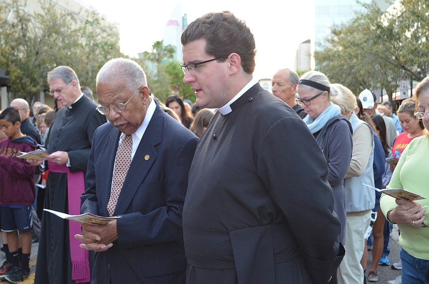 The Rev. Charleston Wilson bows his head during one of the songs.