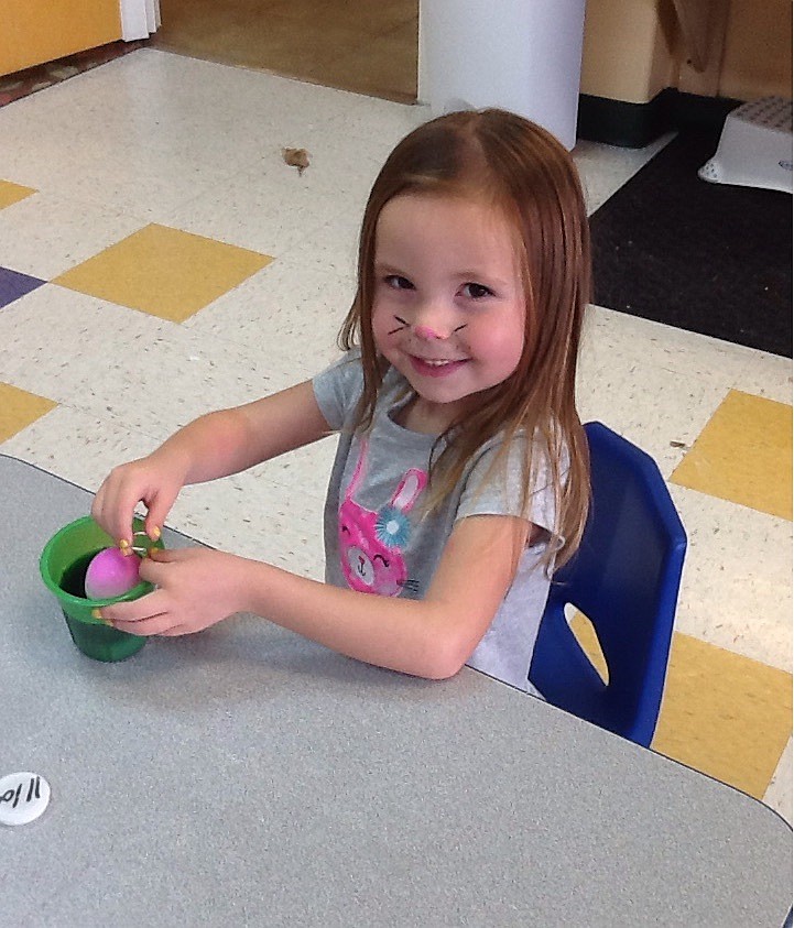 (CONTRIBUTED) Brelynn Straub colors Easter eggs during class.