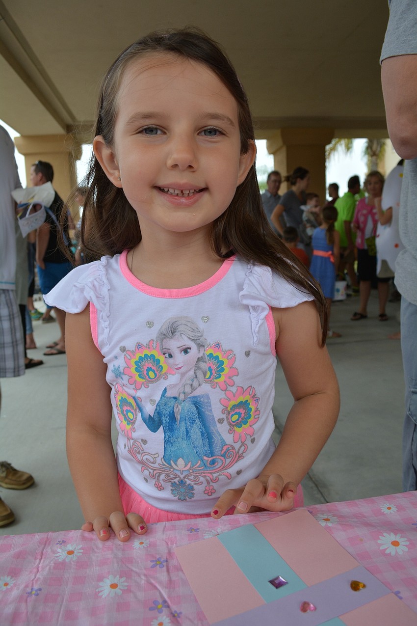 Lacy Sisk, 5, attends with her parents, Wayne and Tammy, of Lakewood Ranch.
