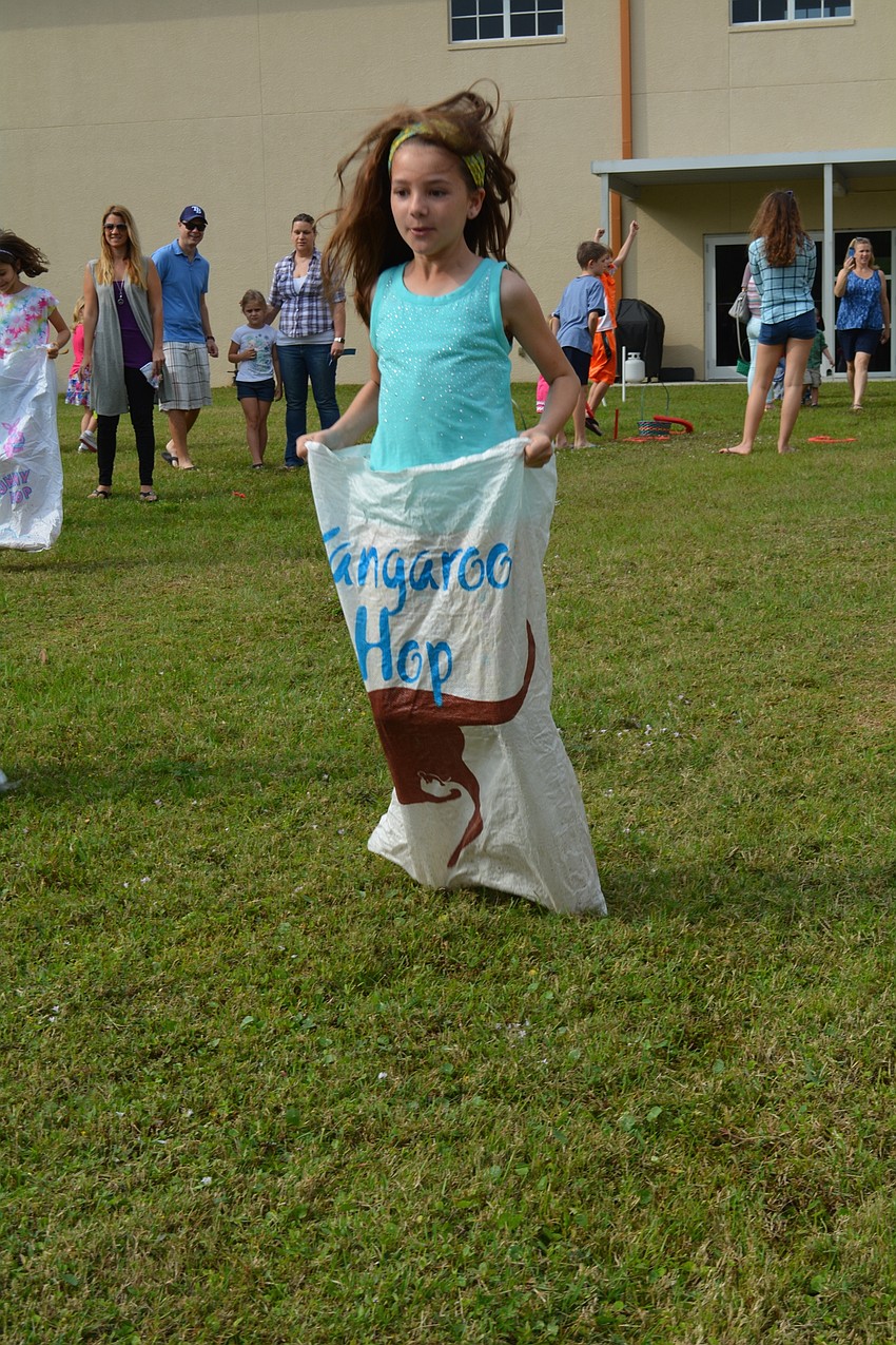 Julianna Mattes, 10, says the potato sack race was easy.