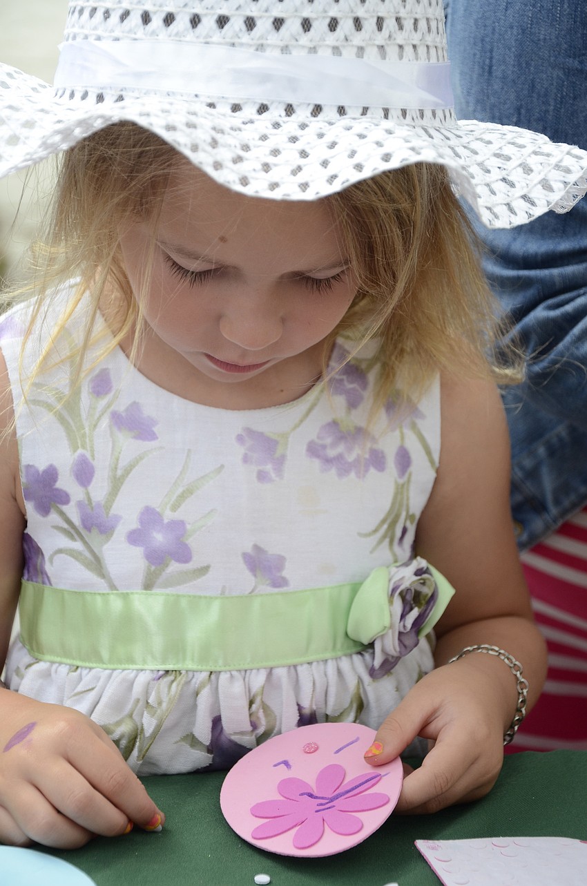Marylin Bingham of Venice designs her egg decoration.