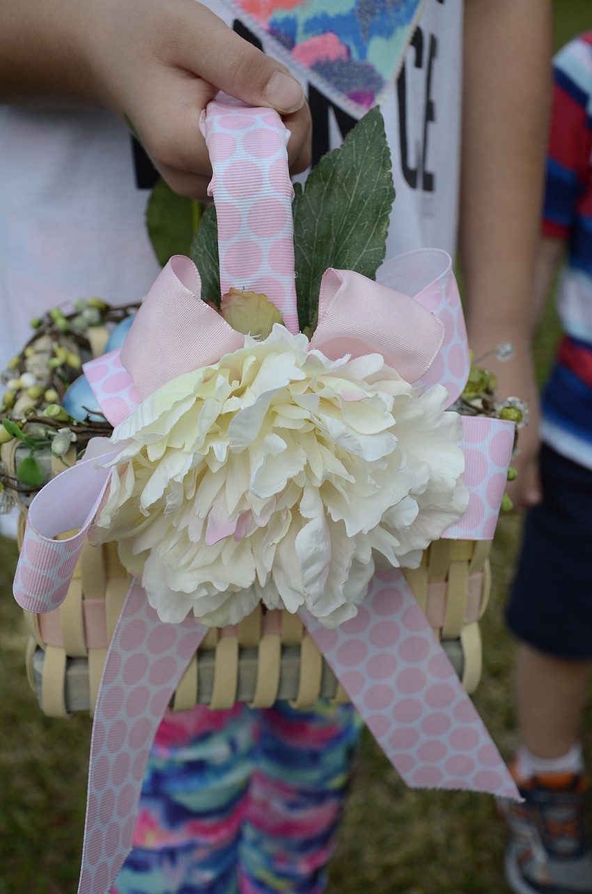 Juliana Hronsich of Lakewood Ranch used this basket decorated by her mom, Anne, to collect Easter eggs.