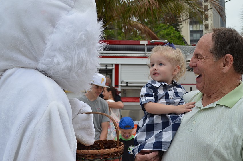 Olivia and Don Miller greet the Easter bunny.