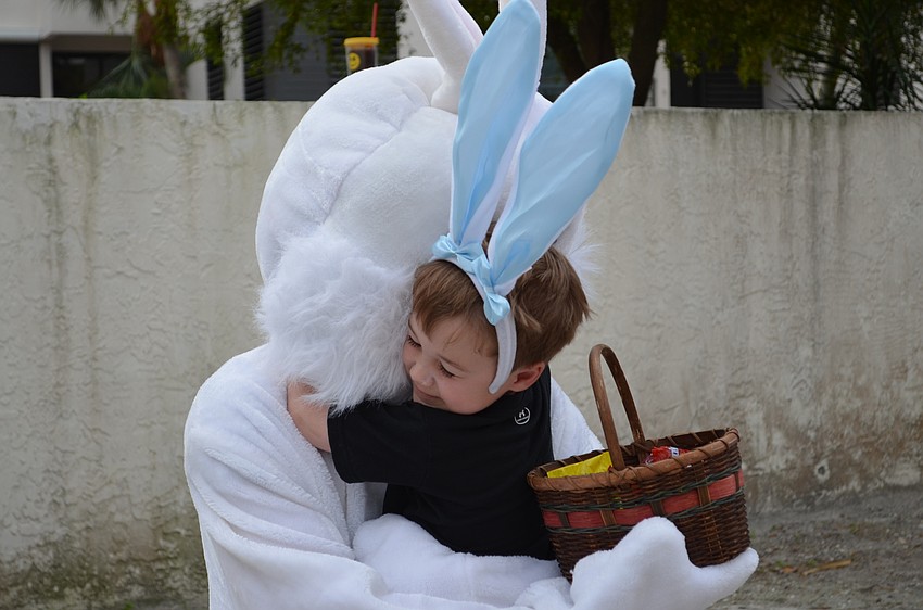 Tanner North greets the Easter bunny.