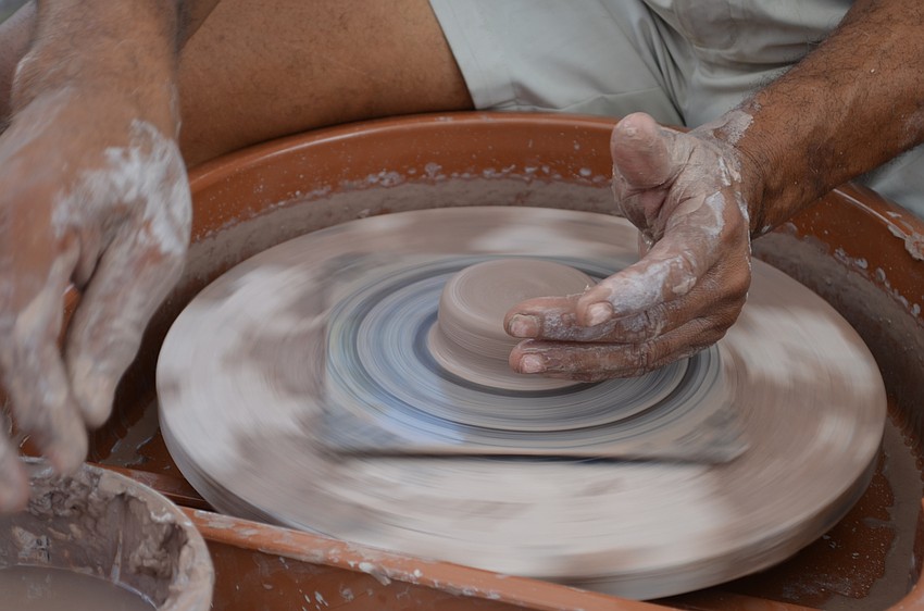 Ricardo Hicks starts on a clay chip and dip bowl set.