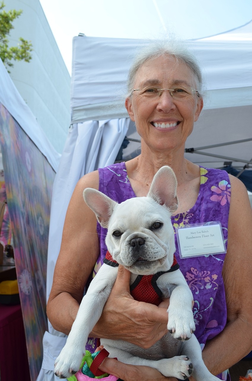 Mary Lou Babich with her 13-week old puppy Sophie.