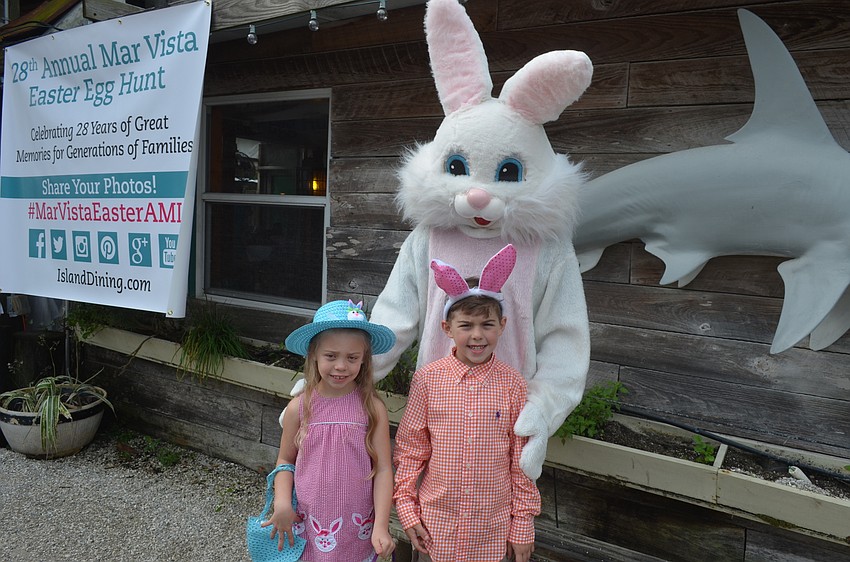 Lauren Nock, 7, and brother, Garrett Nock, 8, with the Easter Bunny