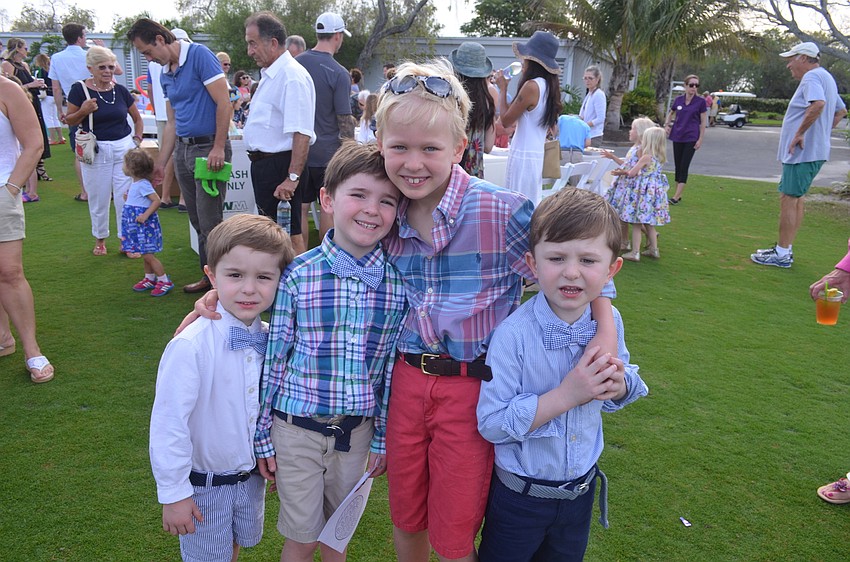 Parker Metz, 4, Sam Metz, 5, Hunter Harris, 8, and Charlie Metz, 4