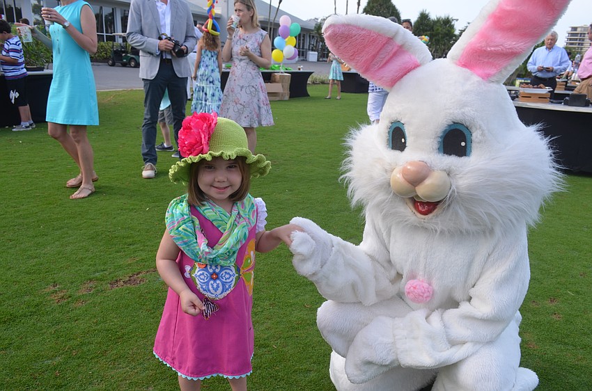 Stella Russell, 3, visits with the Easter Bunny