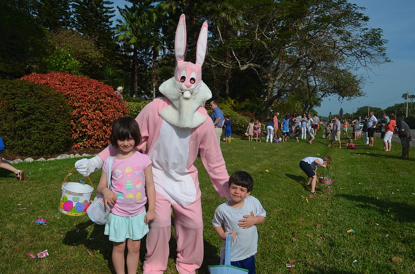 Maggie Fitzpatrick, 6, and brother, John, visit with the Easter Bunny