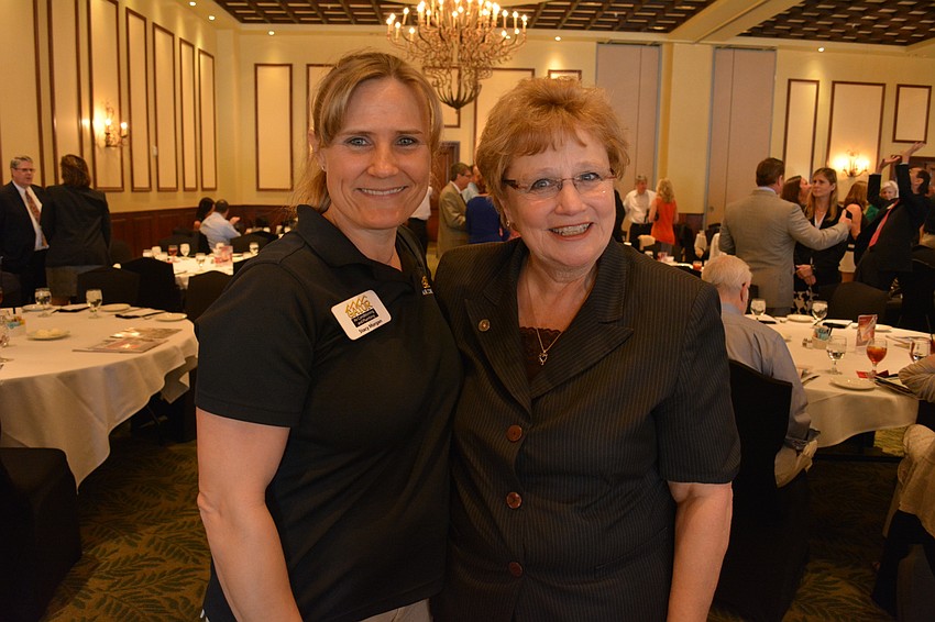 Stacy Morgan, of Gator Air Conditioning and Plumbing, with Susie Kruse, of Gateway Bank
