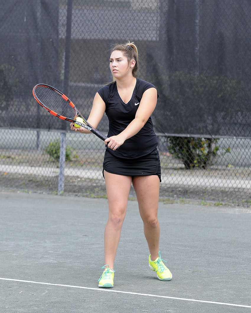 Sarasota's Erica Lester prepares to serve the ball during her No. 2 doubles quarterfinal match.