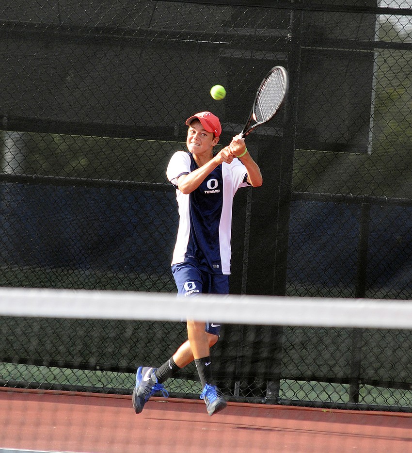 ODA's Connor Krug sends the ball back over the net during his No. 3 singles final match.