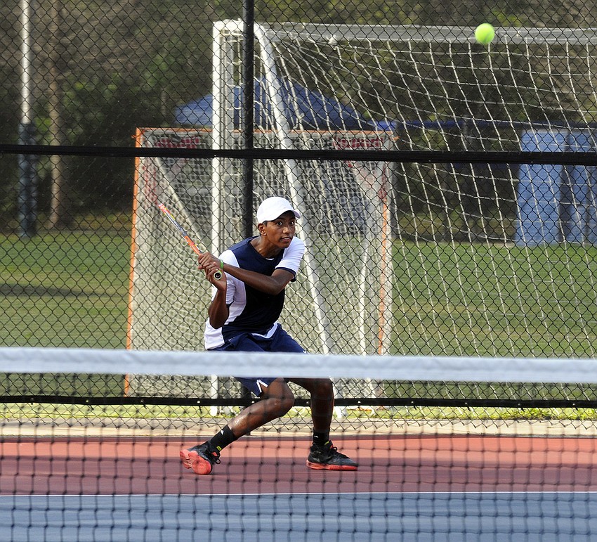 ODA's Josh Samuel returns a serve during his No. 1 singles final match.