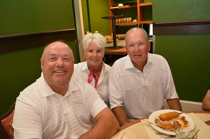 Jeff Blevins sits with Nancy and Dave Nagy.
