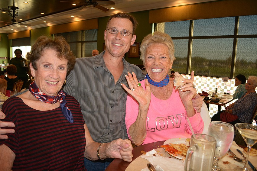 Rosemary and James Fetter and Sandy Annucci can barely hold still for a photo once the song, 