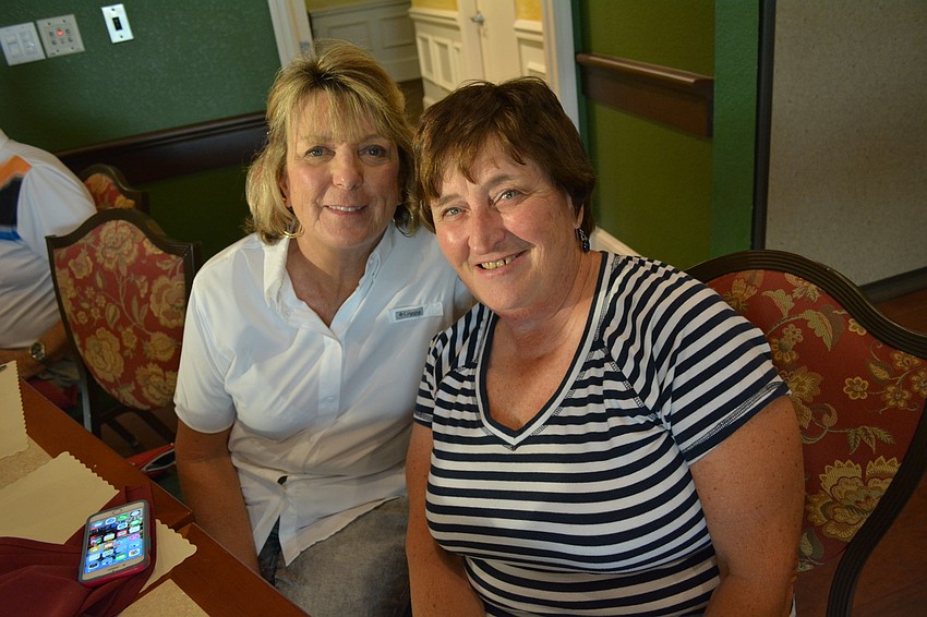Carol Miers and Corinne Lacich catch up.