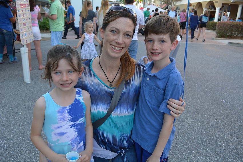 Kendal, Jodi and Brian Casey, of Sarasota, have fun together.